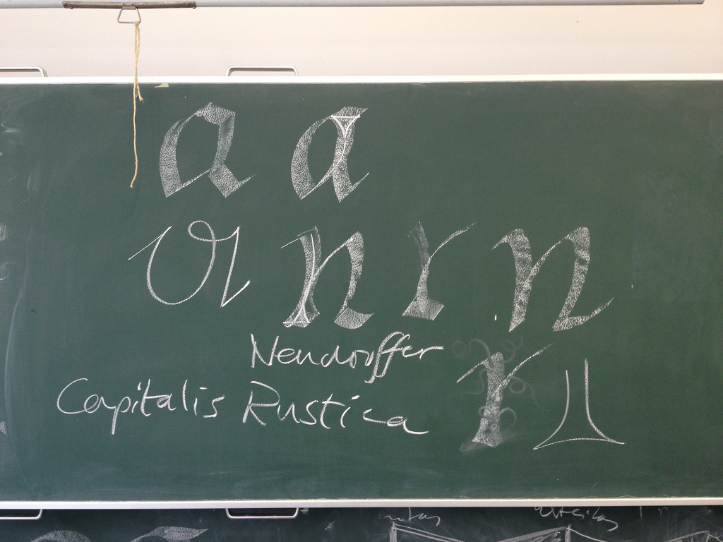 the quick black board – cursive construction